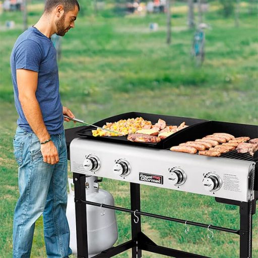 Man grilling meat in a Royal Gourmet GD401